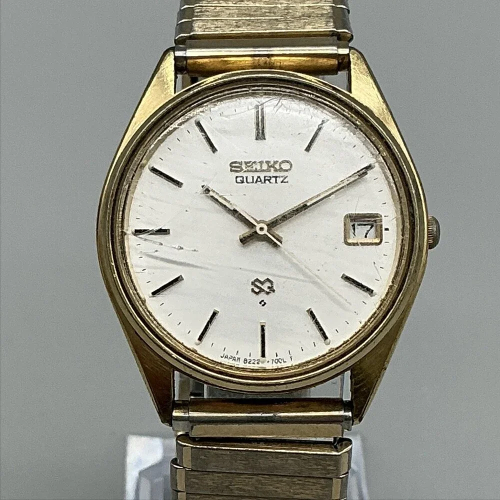 Vintage Seiko Mens Watch 34mm Gold Tone Stretch Band Date 8222-7009 New Battery